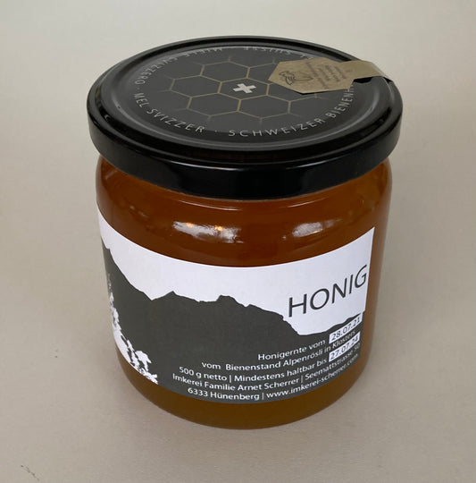 Honigglas mit Berghonig aus Klosters Graubünden. Der Honig ist im Juli 2021 geernet worden. Der lekere Honig von unserer Imkerei ist vom Bienenstand Alpenrösli in Klosters.
